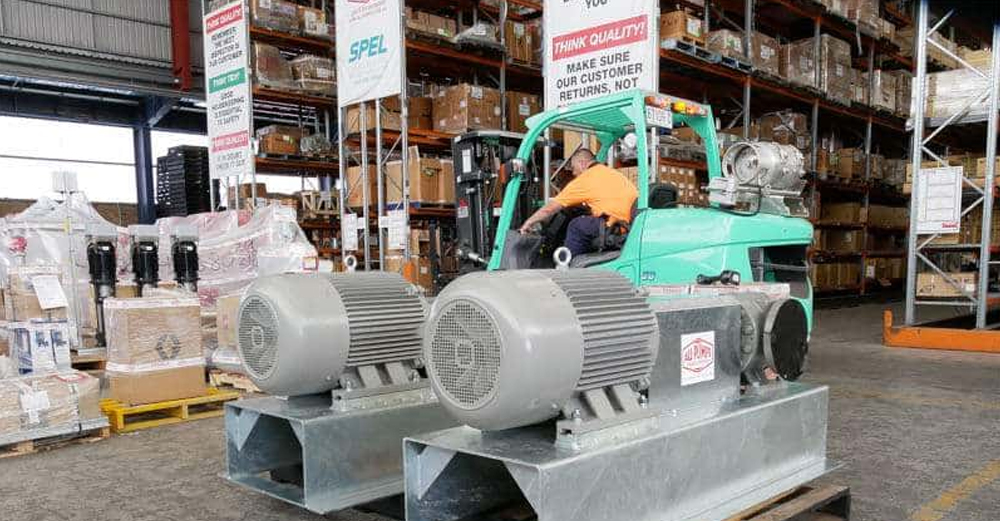 Two heavy-duty Worthington gear pumps with electric motors on skids, ready for installation in bulk fuel handling and large-scale industrial fluid transfer facilities