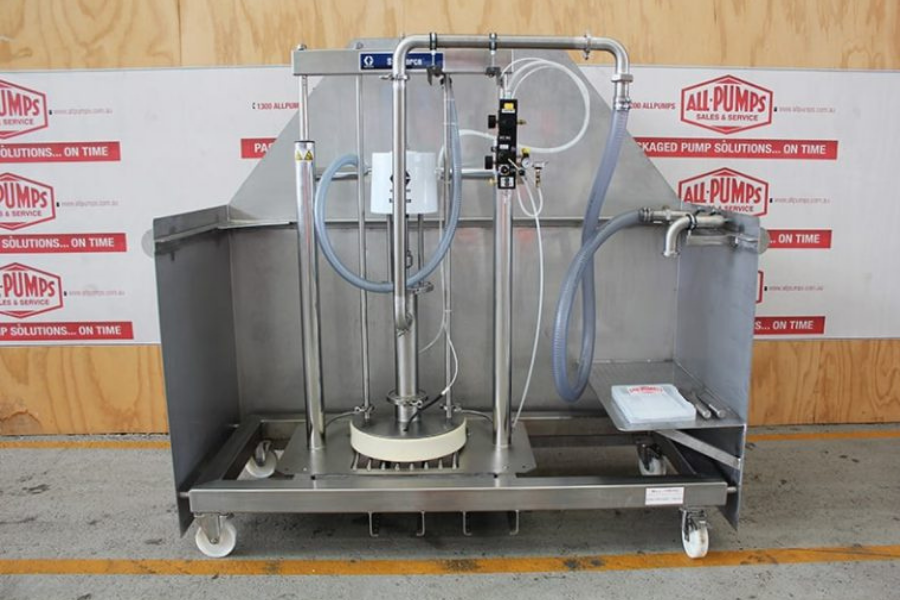 Large metal tank and connected pipework on a skid
