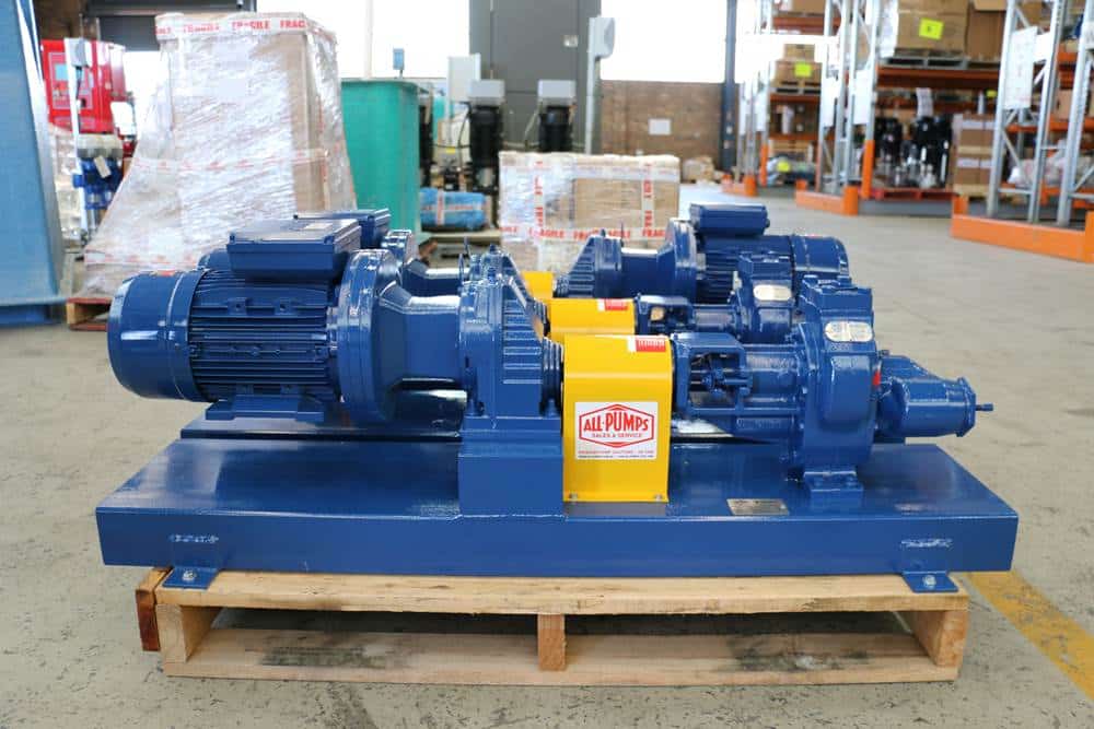A green Roper Gear Pump attached to a blue electric motor