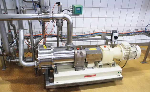 Metal pump connected to process pipework