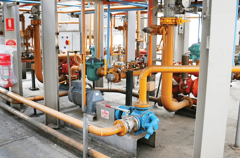 Industrial manufacturing equipment and piping.