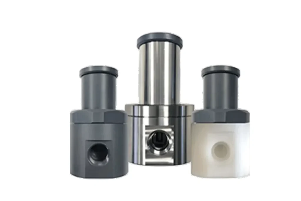 Three upright metallic Blacoh cylinders