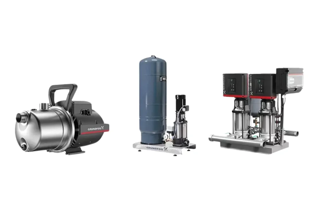 Assorted Grundfos pump units on a white background