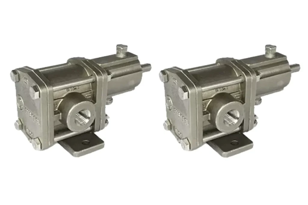 Two metallic Oberdorfer pump units on a white background