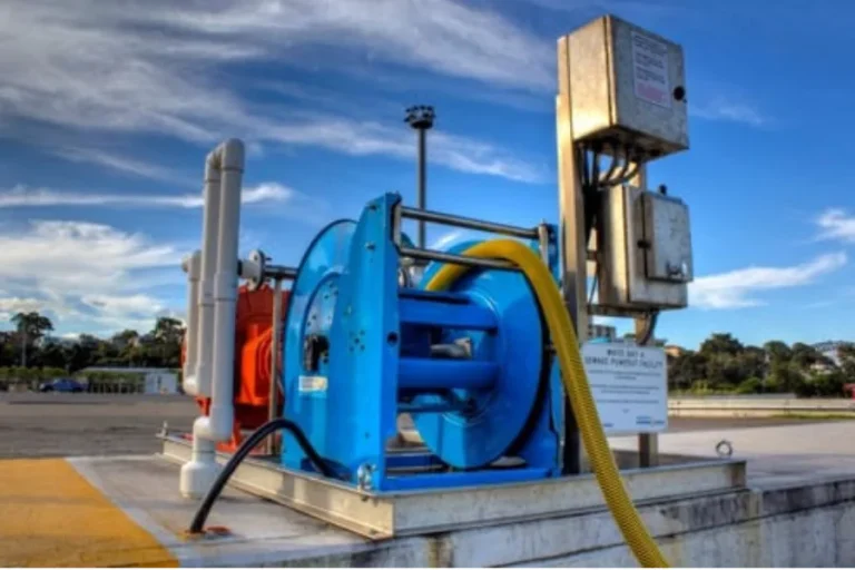 Blue pump equipment installed at a sewage pump-out site.