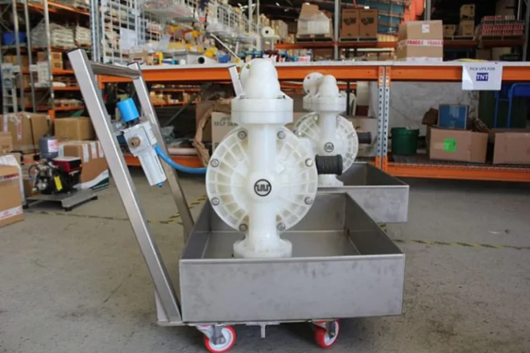 White pump assembly on a workshop floor