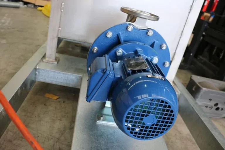 Blue pump assembly with a circular flanged opening
