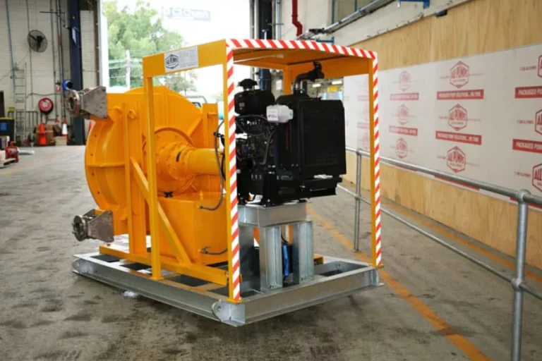 Yellow industrial pump equipment inside a frame